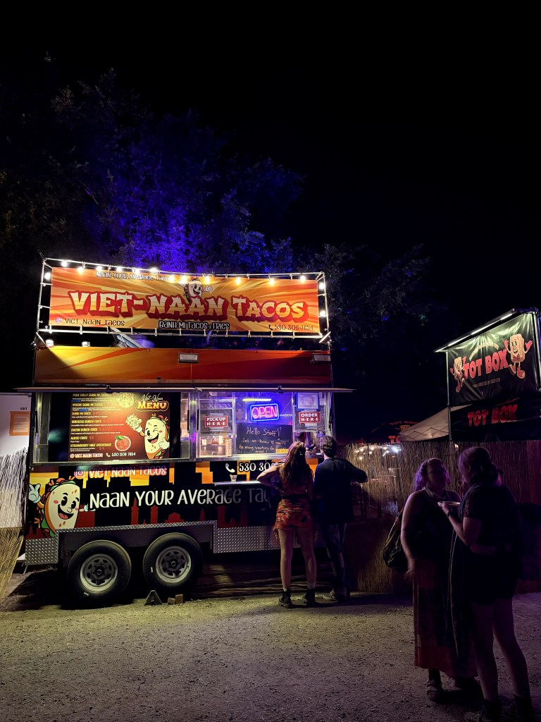 Viet-Naan food truck at Lightning In A Bottle festival nighttime setup.